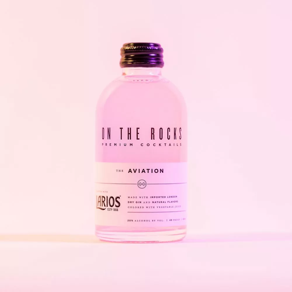 OTR Aviation cocktail bottle in pink lighting 