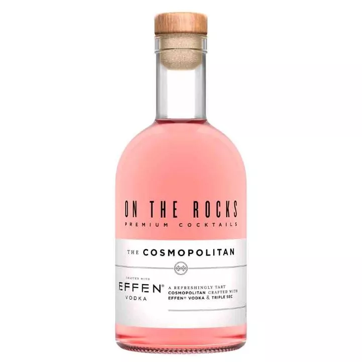 Bottle of OTR cosmopolitan cocktail filled with pink liquid on white background.